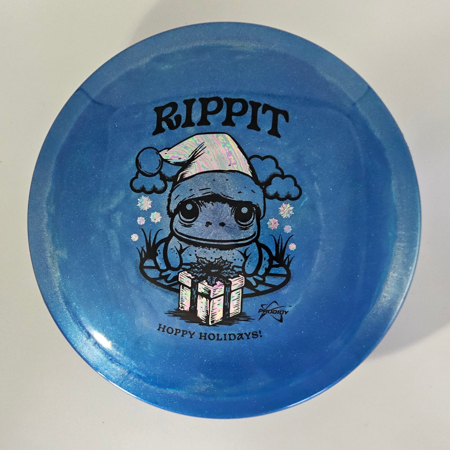 Prodigy F7 500 Spectrum Glimmer Plastic - Rippit "Hoppy Holidays" Stamp